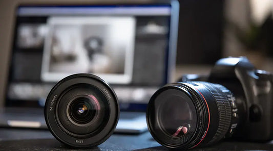Camera lenses shown during in-store resale review at PayMore Clinton