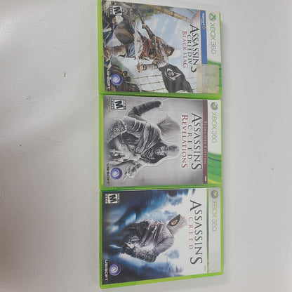 Lot of 3 Microsoft Xbox 360 Assassin’s Creed Games - AC1 Revelations Signature