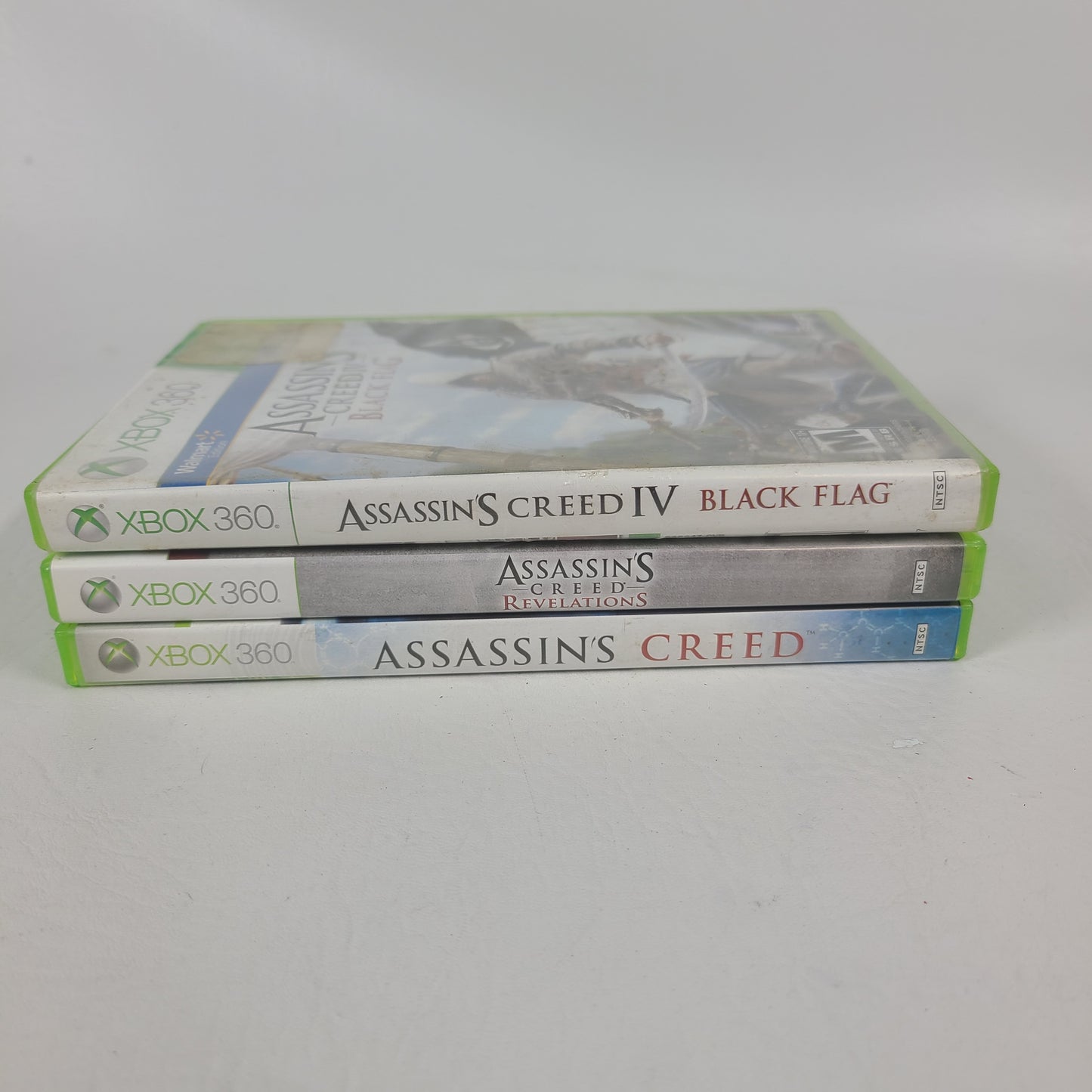Lot of 3 Microsoft Xbox 360 Assassin’s Creed Games - AC1 Revelations Signature