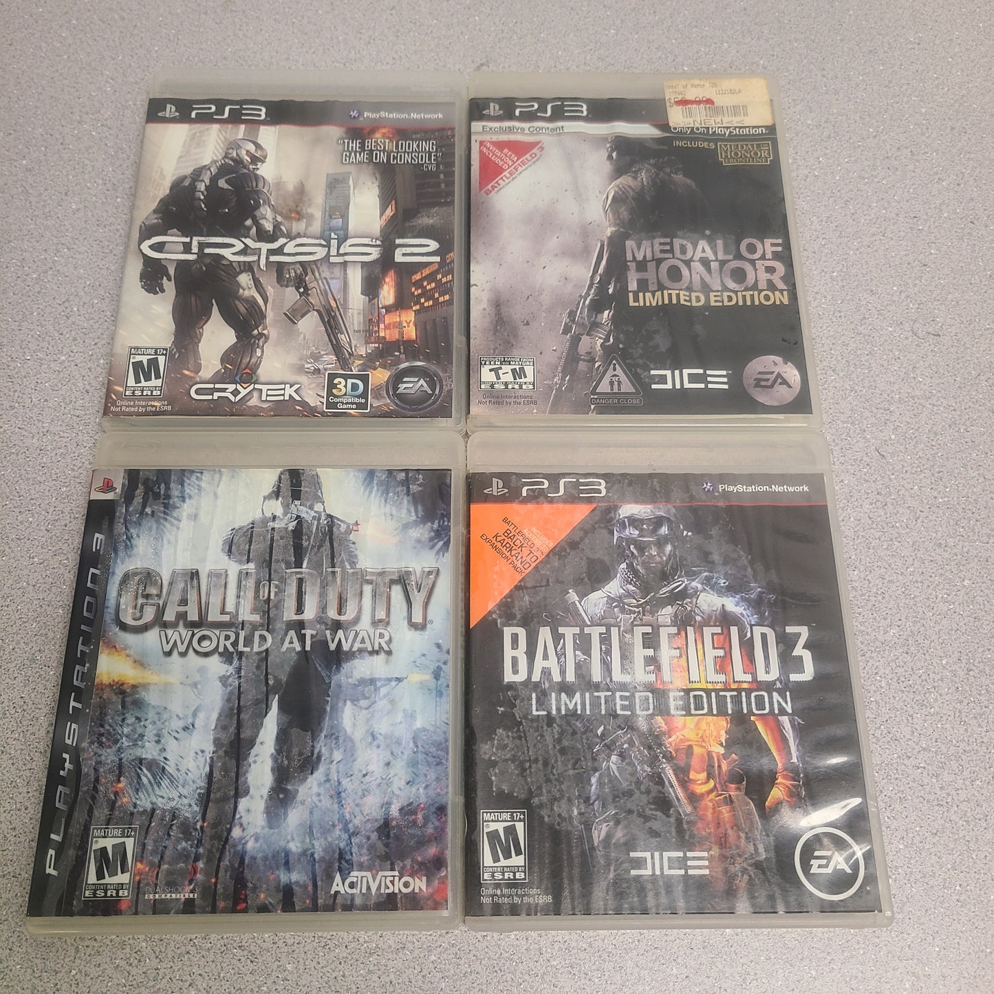 Lot of 4 PS3 Games Call Of Duty World At War Battlefield 3 Crysis Medal Honor