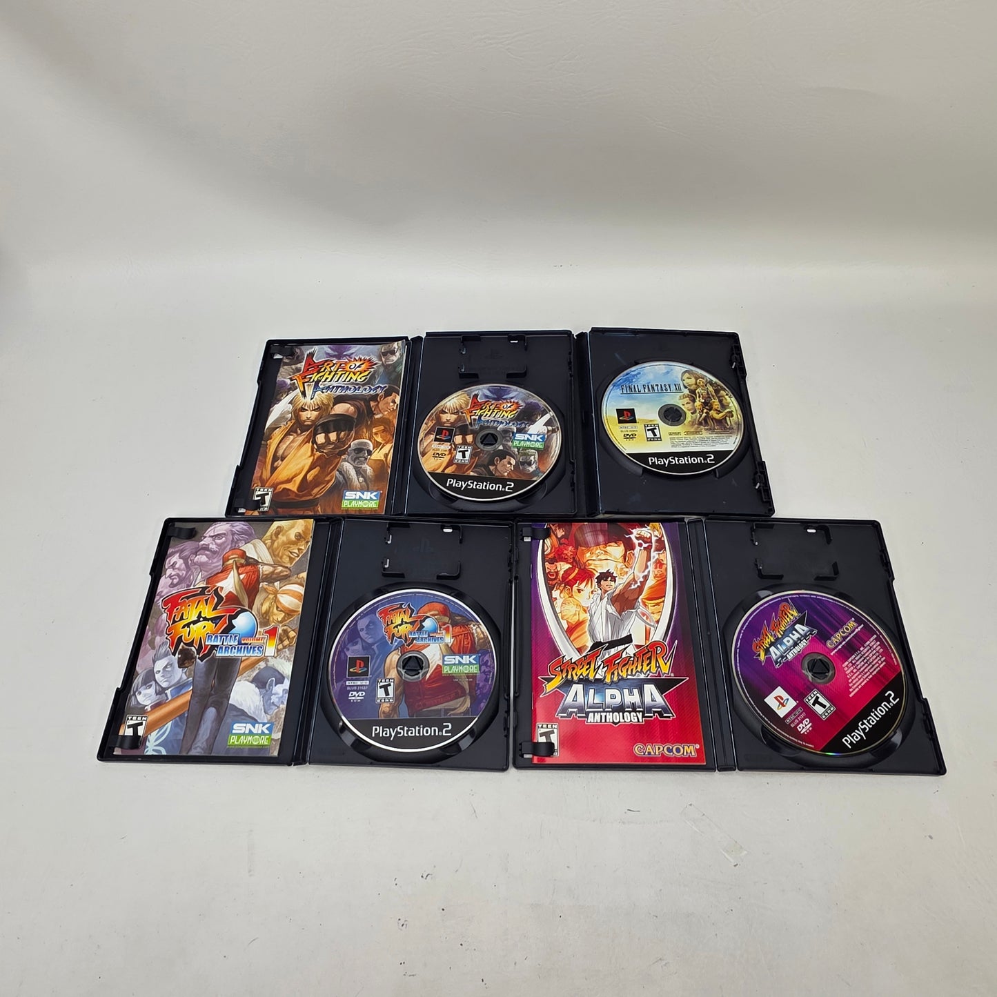 Lot of 4 Sony PS2 Games Art of Fighting Fatal Fury Street Fighter FF XII