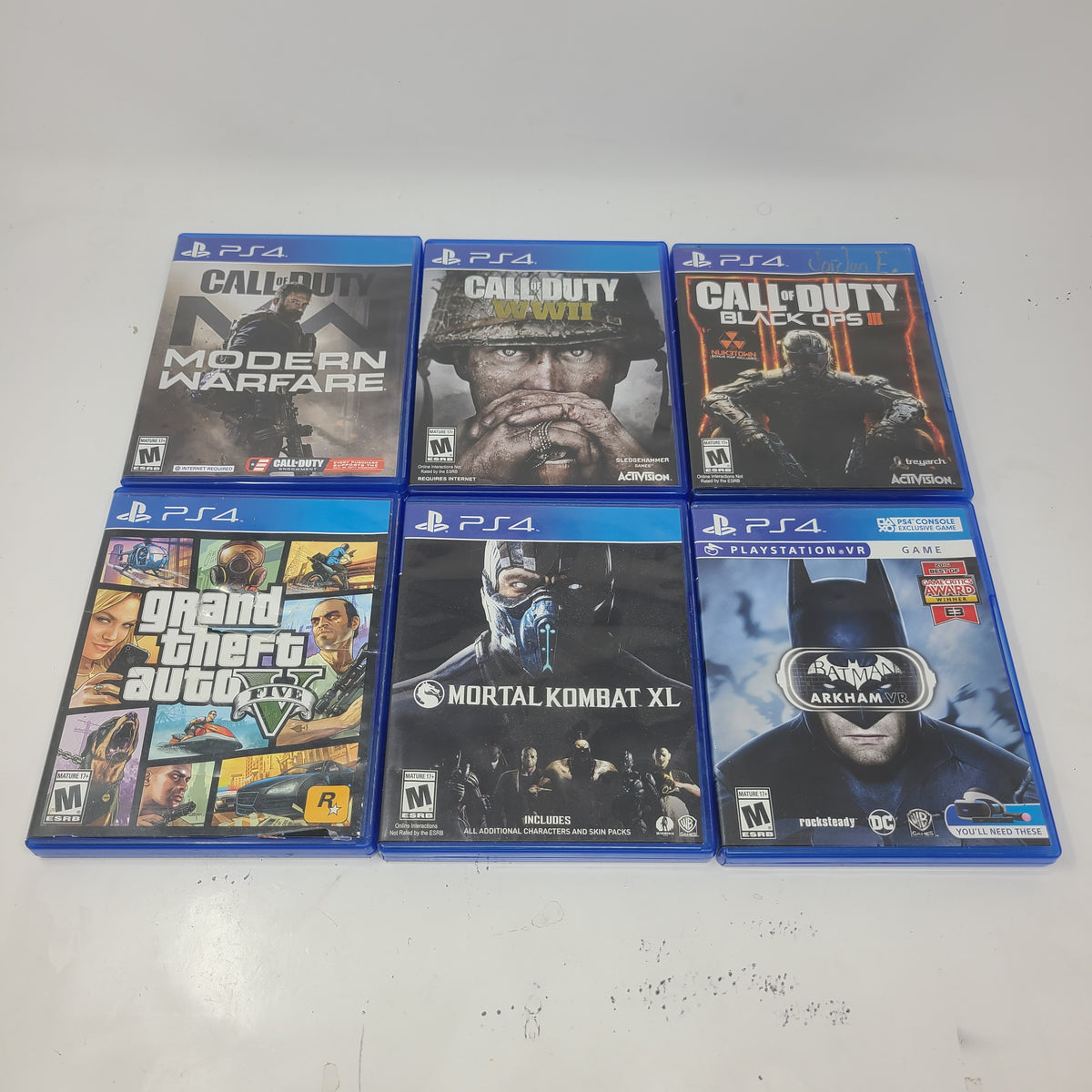 Lot of 6 Games PS4 GTA V Call of Duty Modern Warfare Black Ops 3 WWII Mortal Kombat