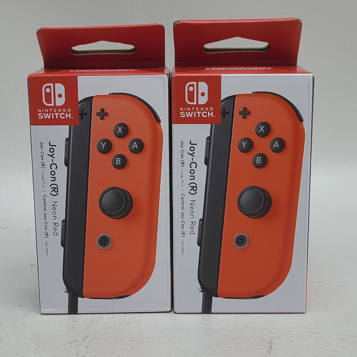 New Lot of 2 Nintendo Switch Joy-Con Grip 
Neon Red