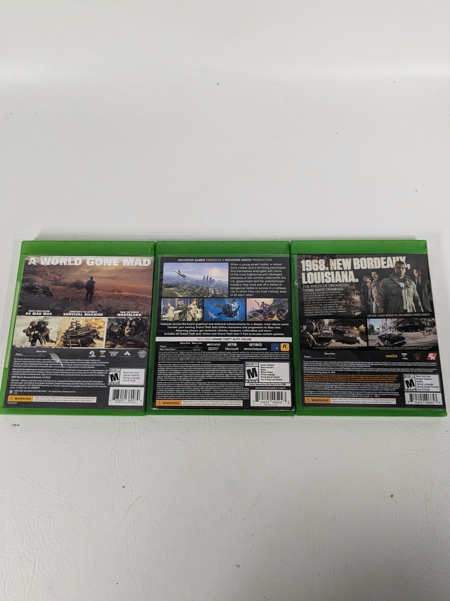 Lot of 3 Microsoft Xbox One Games Mad Max Grand Theft Auto V GTA 5 Mafia III
