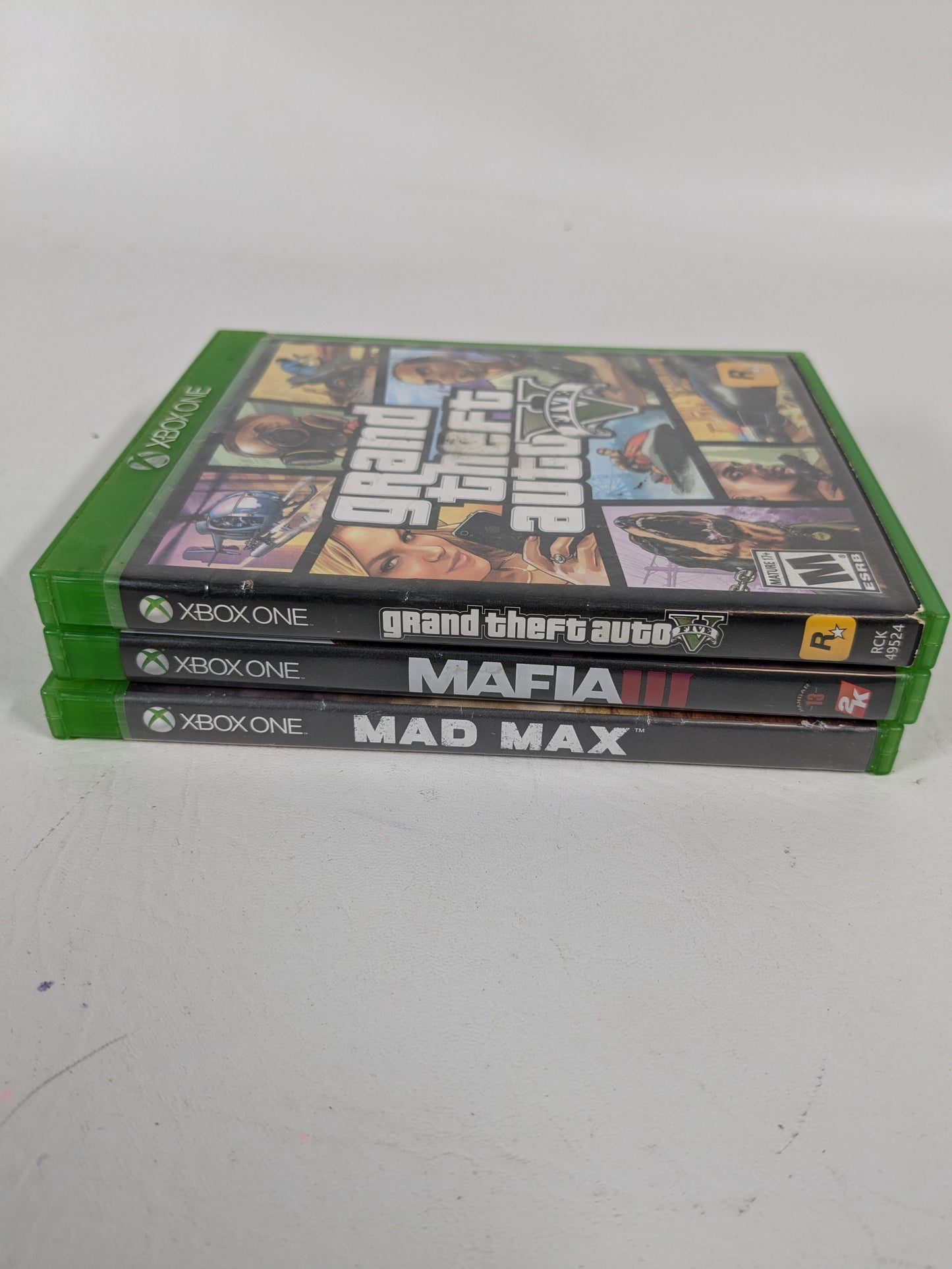 Lot of 3 Microsoft Xbox One Games Mad Max Grand Theft Auto V GTA 5 Mafia III