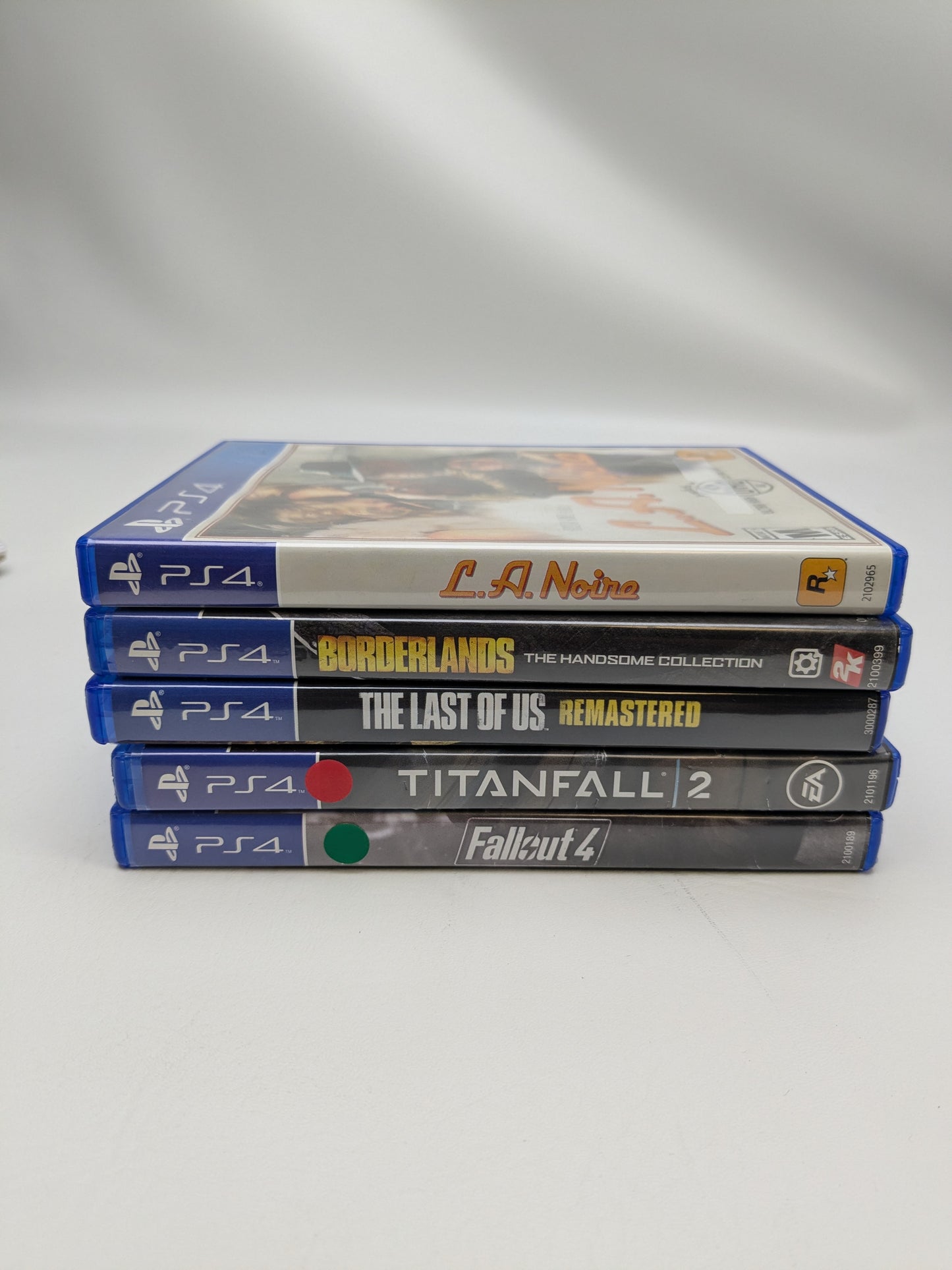 Lot of 5 PS4 Games Last of Us Remastered Fallout 4 LA Noire Titanfall Borderland