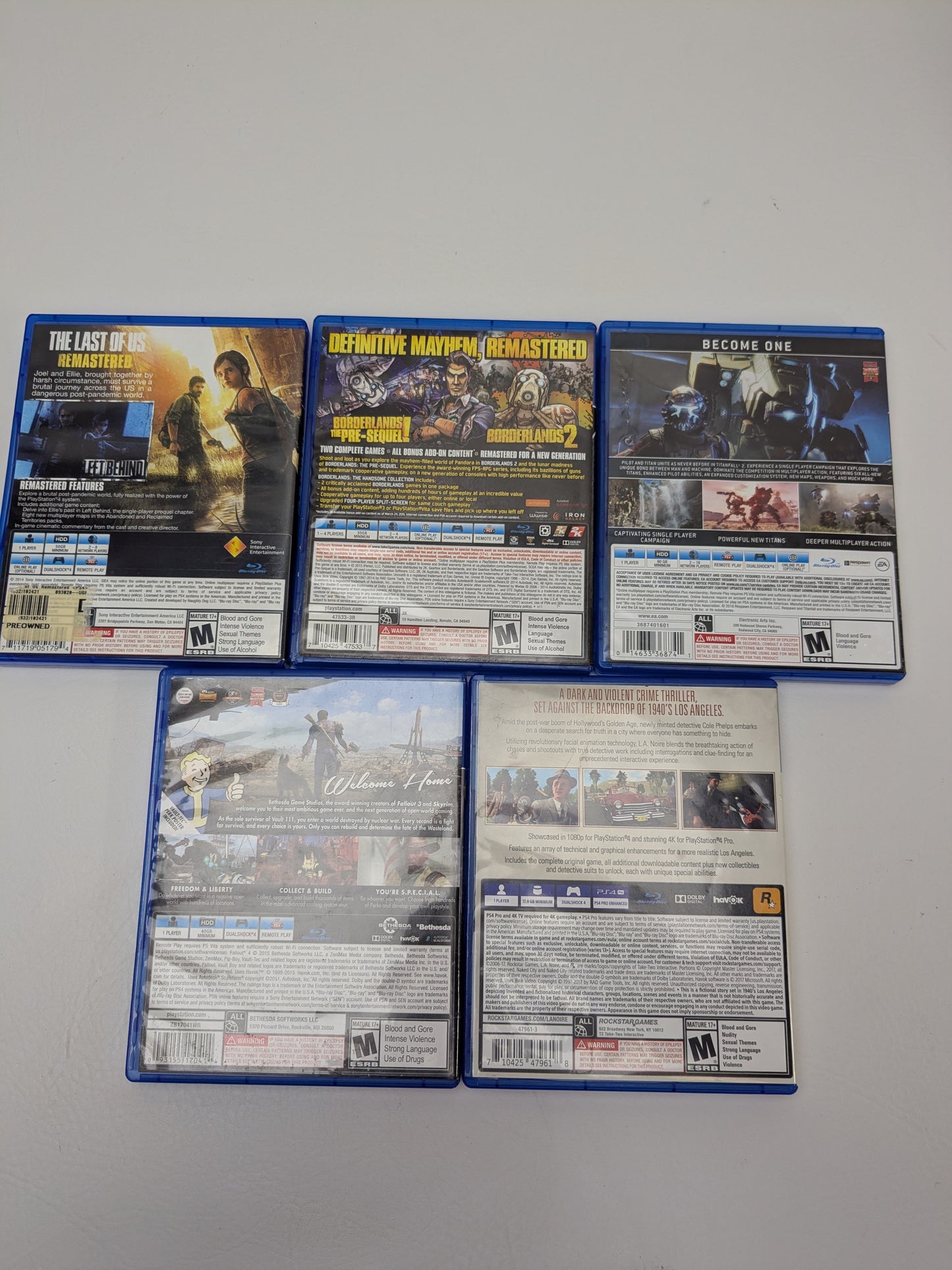 Lot of 5 PS4 Games Last of Us Remastered Fallout 4 LA Noire Titanfall Borderland